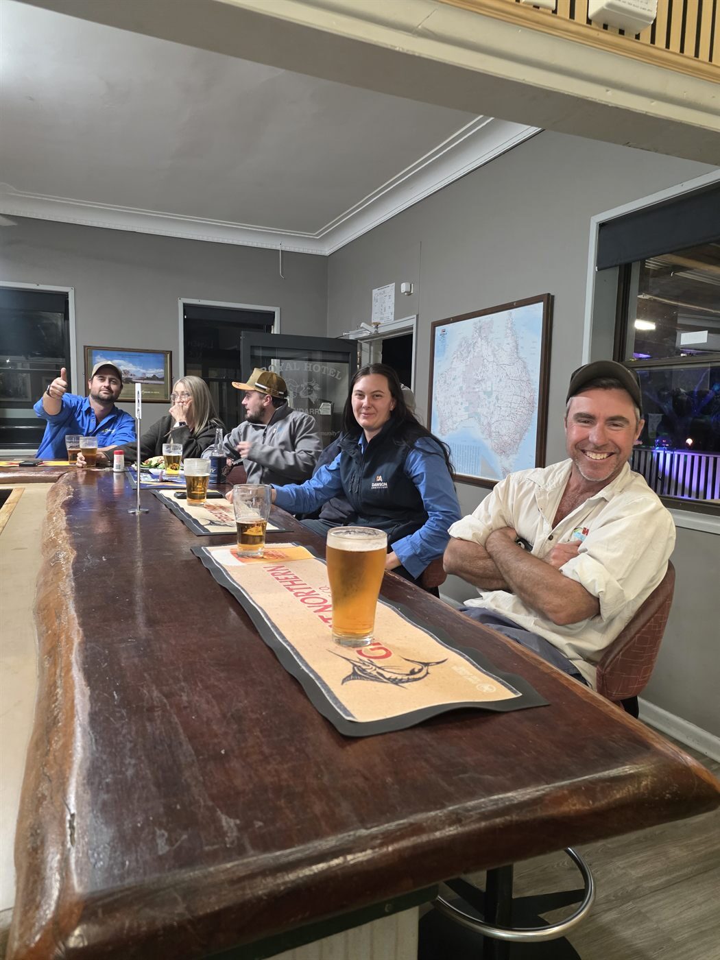 Locals enjoying a beer at the front bar of The Royal Hotel Meandarra