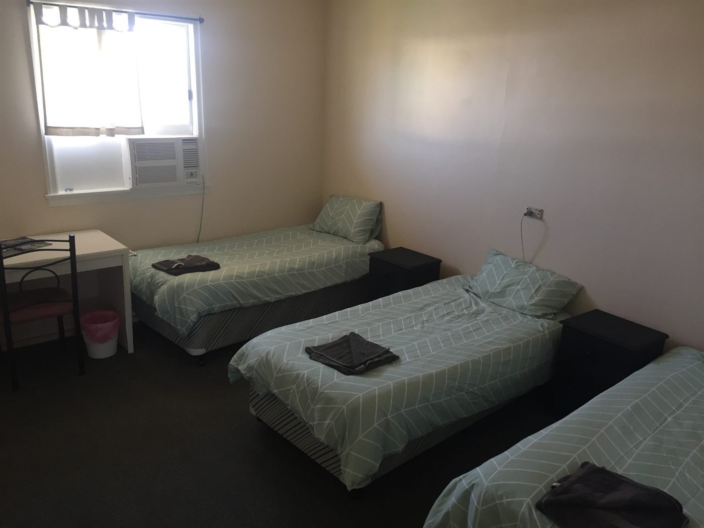 Upstairs guest room with single beds